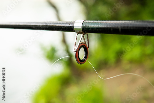 fishing rod by the river