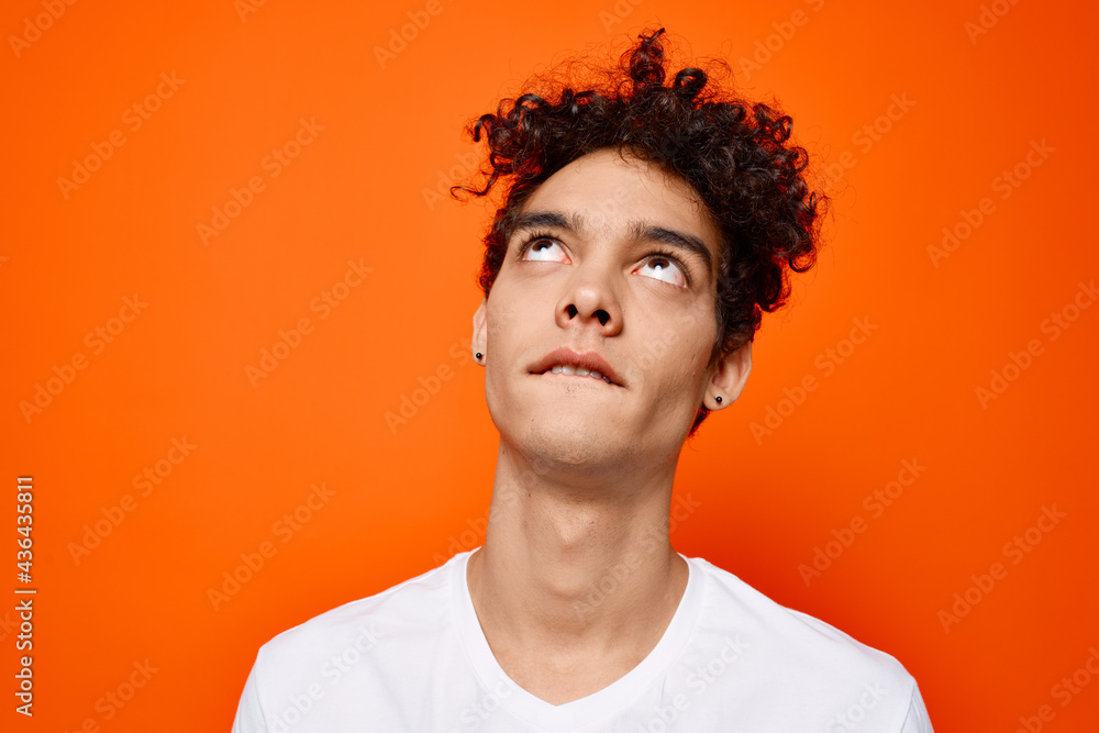 guy in white t-shirt curly hair cropped view studio guy in white t-shirt curly hair cropped view studio