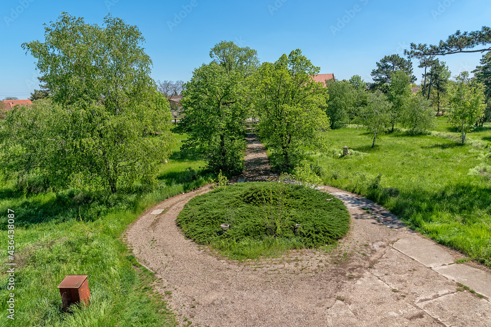 Novo Milosevo, Serbia - May 04, 2021: Park of Karaconji Castle in Novi Milosevo was built in 1857 and is one of the cultural monuments of great importance.