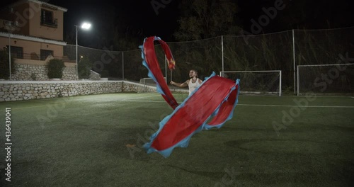 Man Performing Traditional Chinese Dragon Dance photo