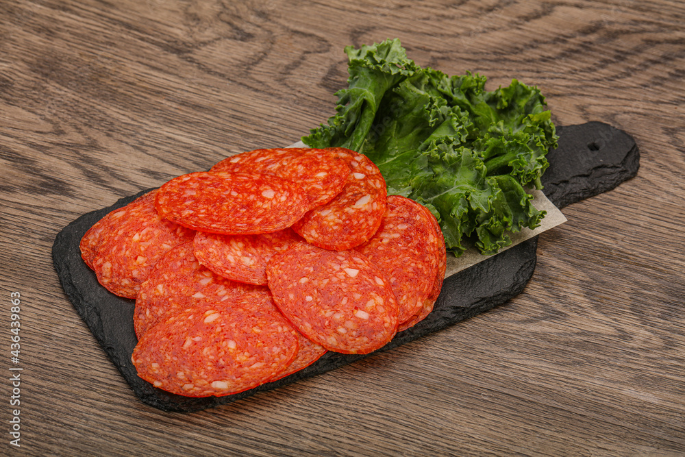 Italian spycy pepperoni sausage slices Italian spycy pepperoni sausage slices