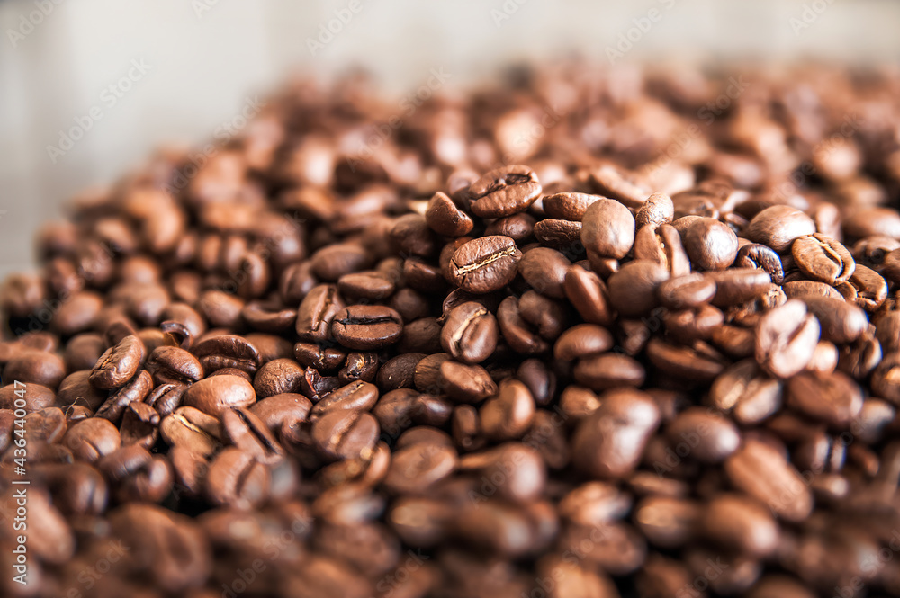 Coffee background close-up macro. Lots of coffee beans and copy space. Coffee background close-up macro. Lots of coffee beans and copy space.
