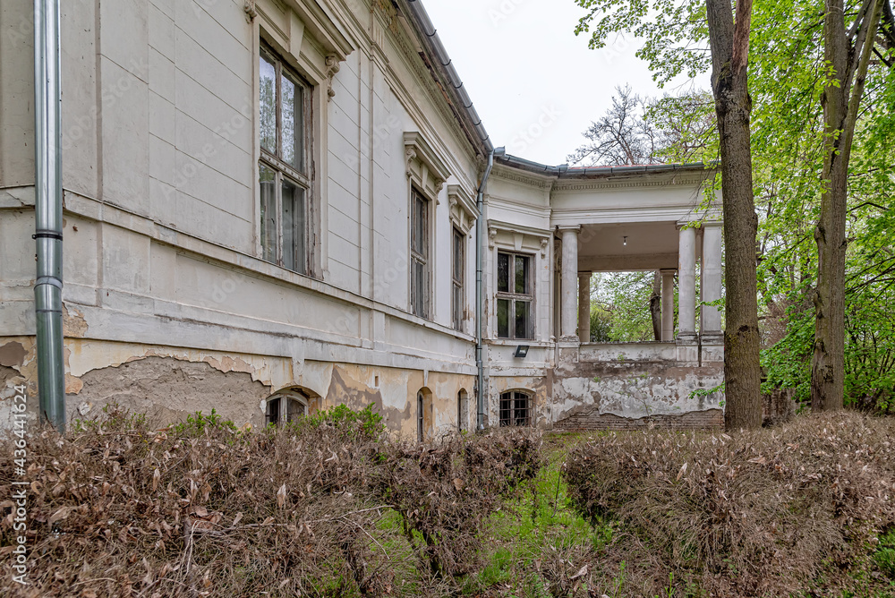 Novi Becej, Serbia - May 01, 2021: Castle “Sokolac” in Novi Becej. Sokolac Castle was built at the end of the 19th century as a residential building. Novi Becej, Serbia - May 01, 2021: Castle “Sokolac” in Novi Becej. Sokolac Castle was built at the end of the 19th century as a residential building.