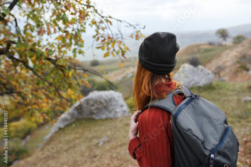 Wallpaper Mural woman tourist with backpack on nature landscape travel adventure Torontodigital.ca