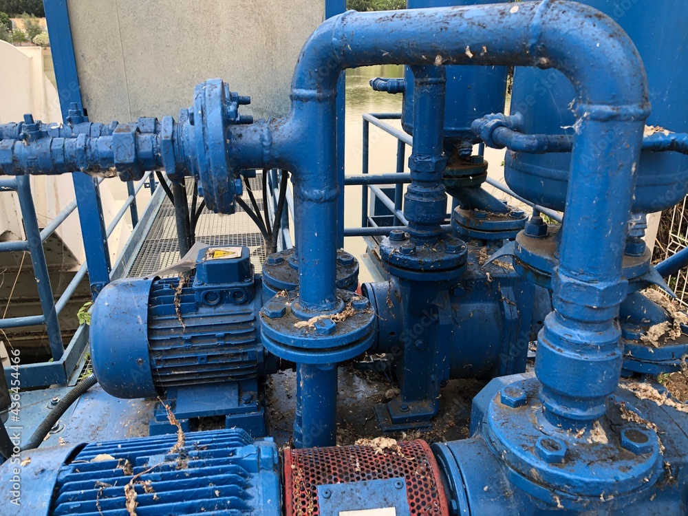 Blue painted engine and pipe system with dirt and rust Blue painted engine and pipe system with dirt and rust