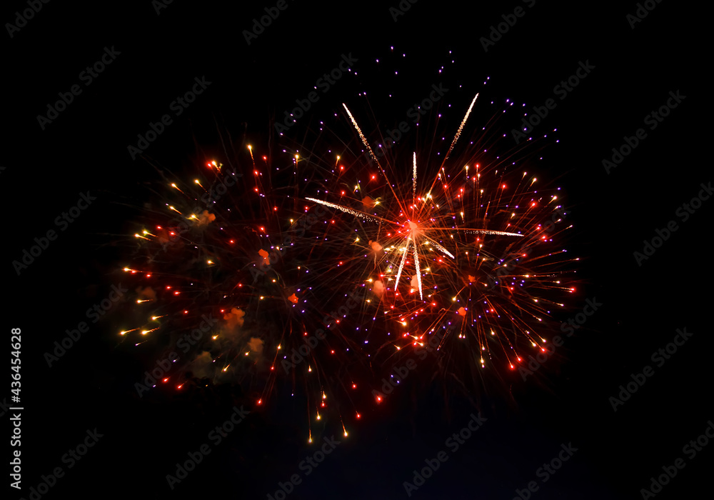 Bright fiery fireworks against the dark night sky. Abstract colorful beautiful fireworks salute against dark sky. Firework Fiery flowers during the holiday. Bright fiery fireworks against the dark night sky. Abstract colorful beautiful fireworks salute against dark sky. Firework Fiery flowers during the holiday.