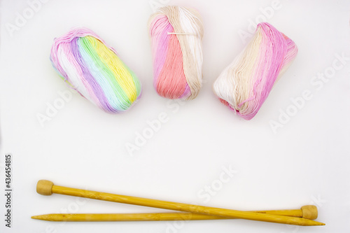 Crochet threads. Yarn of different colors and textures. Knitting needles and yarn.