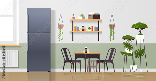 silver refrigerator in modern kitchen interior home appliance concept horizontal