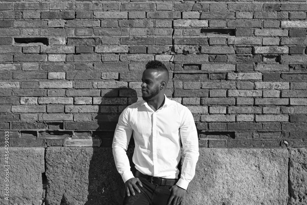 African-American man on a business trip to Europe takes advantage of a few days to go sightseeing in Seville. Spain African-American man on a business trip to Europe takes advantage of a few days to go sightseeing in Seville. Spain