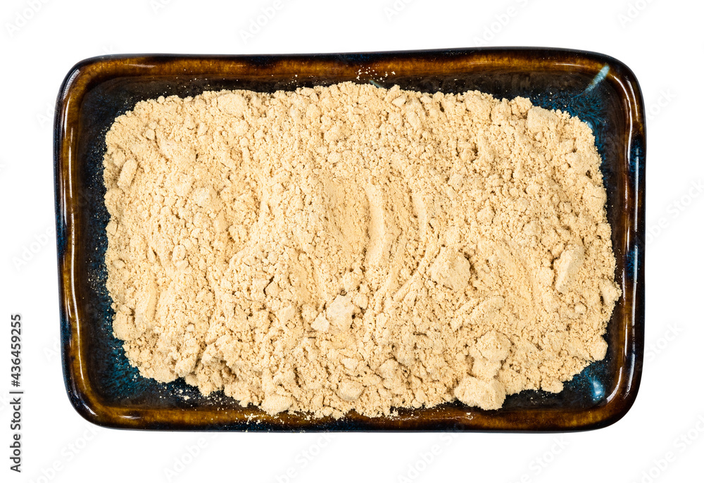 top view of ginger powder in ceramic bowl cutout top view of ginger powder in ceramic bowl cutout