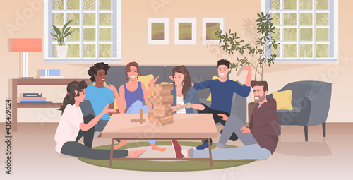 people playing jenga spending time together mix race friends having fun table games concept
