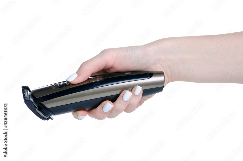 Hair clipper trimmer in hand on white background isolation Hair clipper trimmer in hand on white background isolation