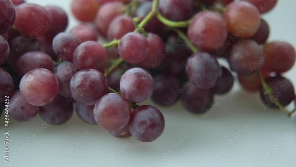 Panning right to left shot fresh seedless grapes. Slow motion shot Panning right to left shot fresh seedless grapes. Slow motion shot