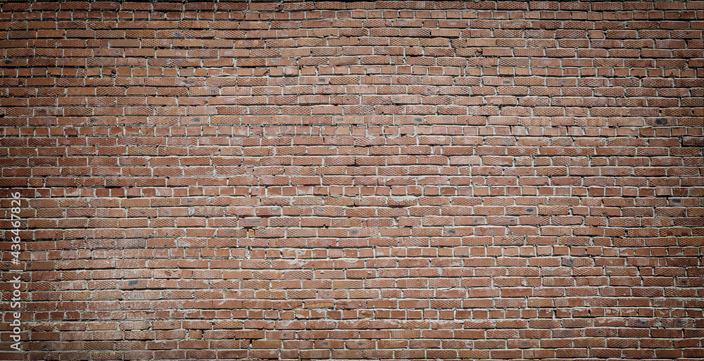 Fototapeta premium Background of old vintage brick wall. Selective focus