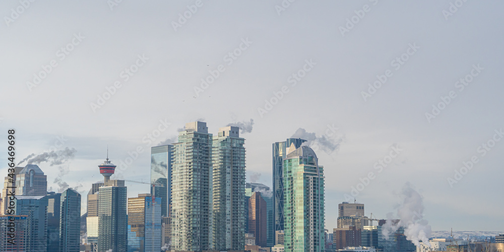 Calgary Alberta Downtown skyline in winter - Steam from buildings