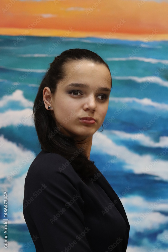 Beautiful young happy girl in black jacket close up studio portrait, Beautiful young happy girl in black jacket close up studio portrait,