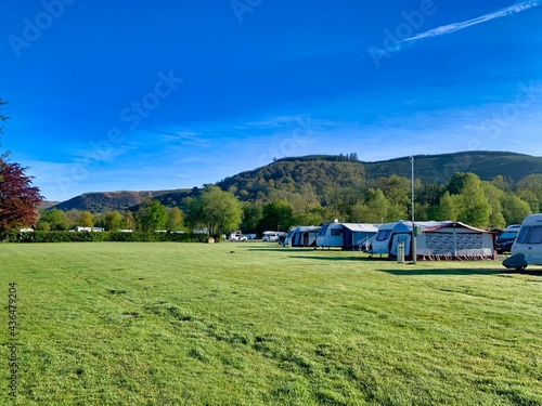 Картината върху платно Campsite camping in field motorhomes and caravans