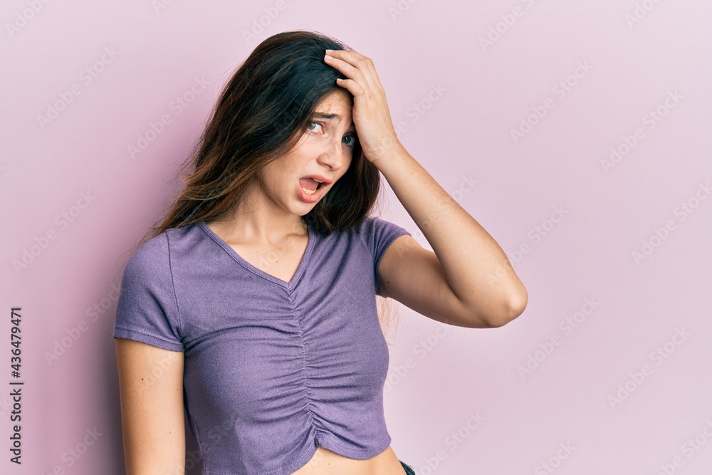 Young caucasian woman wearing casual clothes surprised with hand on head for mistake, remember error. forgot, bad memory concept. Young caucasian woman wearing casual clothes surprised with hand on head for mistake, remember error. forgot, bad memory concept.