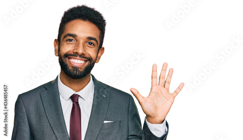 Young african american man wearing business clothes showing and pointing up with fingers number five while smiling confident and happy.