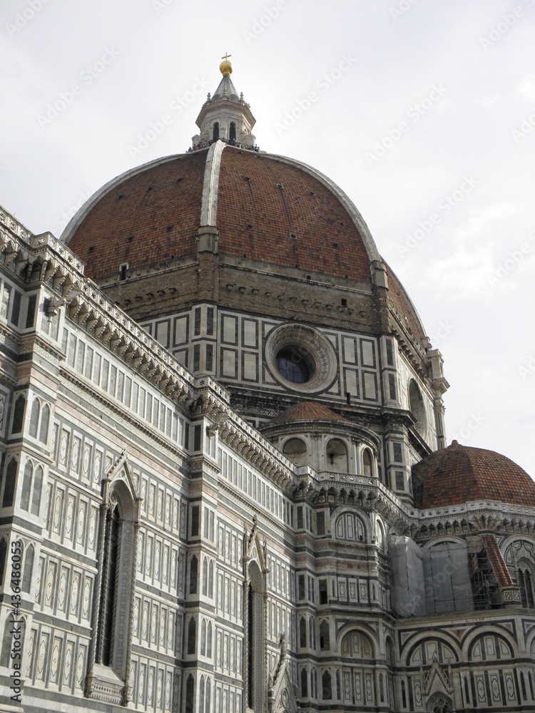 Cathedral of Santa Maria del Fiore. Huge dome and parts of church with intricate designs and 