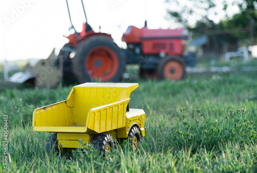 Toy dump truck on farm