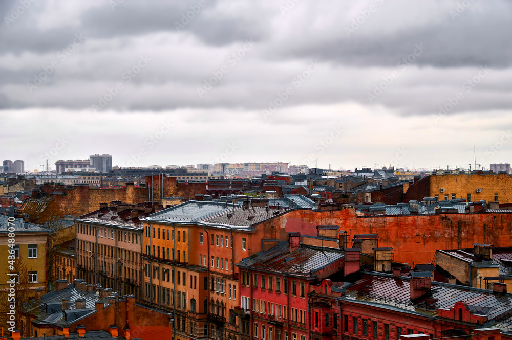 Roofs of St. Petersburg. Bad weather in the city. Urban landscape at roof level.