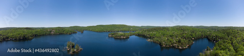 Drone aerial shot over Grand Lake in Val-des-Monts, QC, Canada