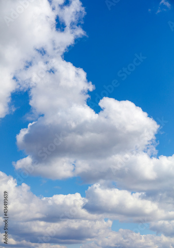 White clouds against blue sky