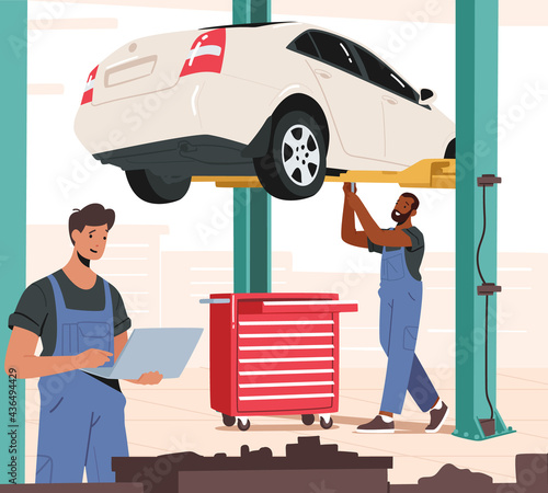 Mechanic in Blue Overalls Repair Broken Car Hang on Elevator. Workers with Laptop and Instruments Maintenance Auto