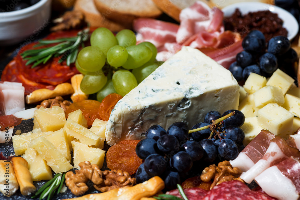 assorted cheeses, fresh fruits and meats