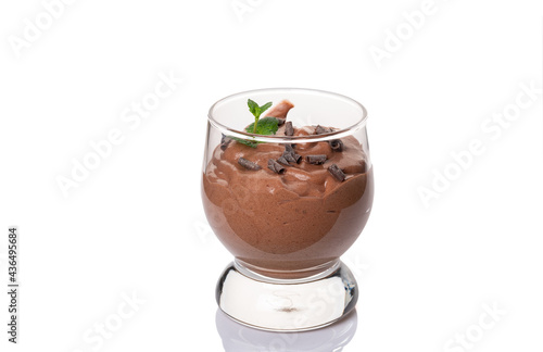 Vegan chocolate mousse glass isolated on white background. photo