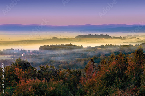 Beautiful sunrise in a misty valley in Poland