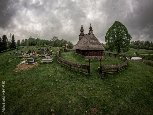 View of a wooden church in the village of Hrabova Roztoka in Slovakia photo