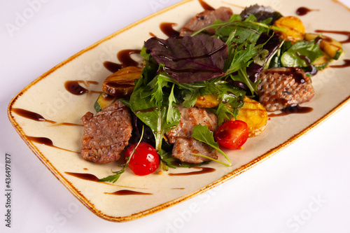 Veal with vegetables and sauce