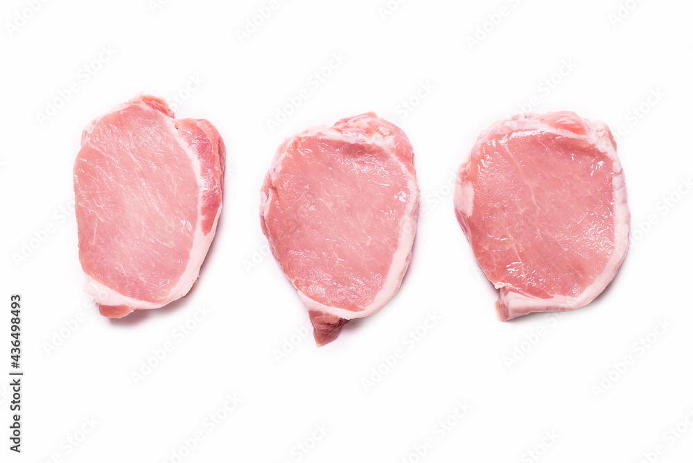 Raw pork pieces isolated on a white background. Raw pork pieces isolated on a white background.