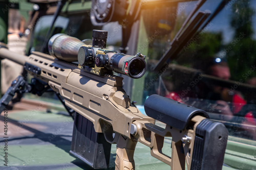 Sniper rifle with a telescopic sight for long range shooting in war. Sniper rifle with a telescopic sight for long range shooting in war.
