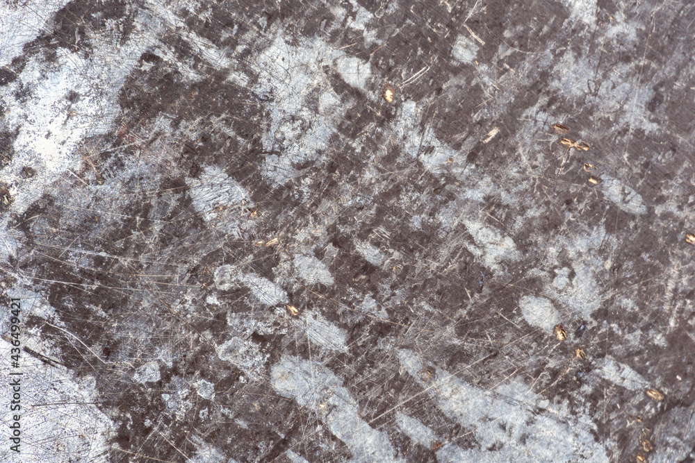 Fototapeta premium The texture of a stone wall, floors, concrete destruction, metal corrosion and rusty antiquity, the basis of building iron and floors, chips and paint smears