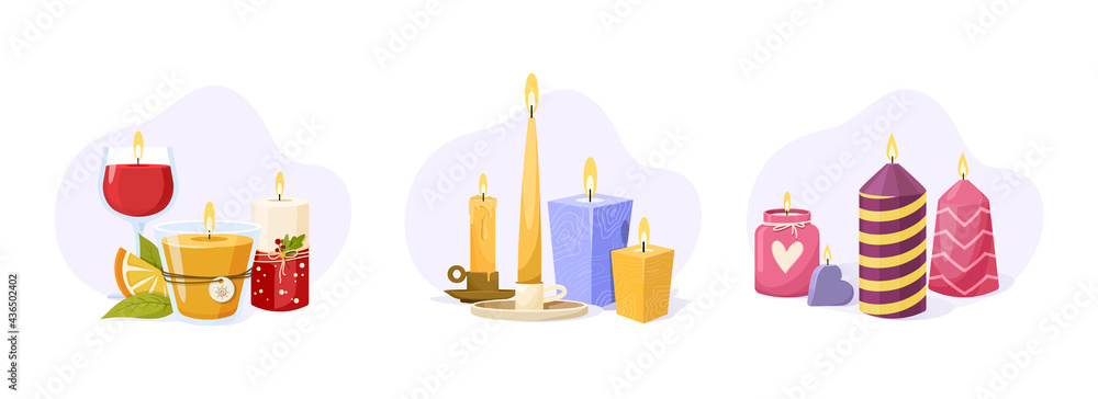 Fototapeta premium Set of burning wax candles with fire flame on light background. Christmas, scented wax candles for home, romance, aromatherapy or birthday. Cozy decor for spa, fragrance, holiday or romantic