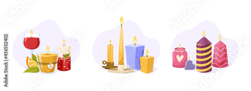 Set of burning wax candles with fire flame on light background. Christmas, scented wax candles for home, romance, aromatherapy or birthday. Cozy decor for spa, fragrance, holiday or romantic