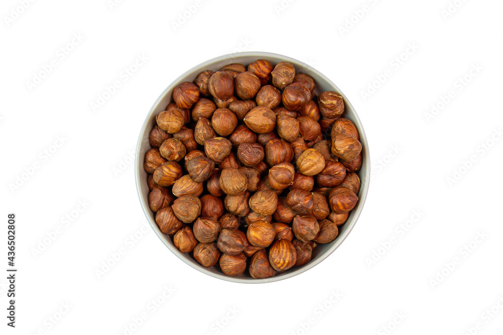 hazelnut in bowl on white background close up hazelnut in bowl on white background close up