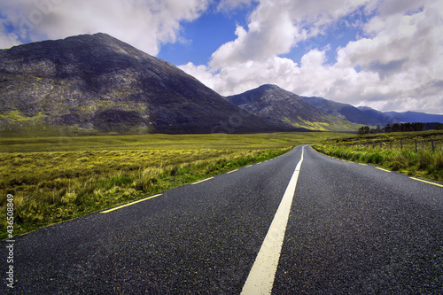 Obraz na płótnie Beautiful landscape scenery of road by the lough inagh with mountains in the background at Connemara National park in county Galway, Ireland w salonie