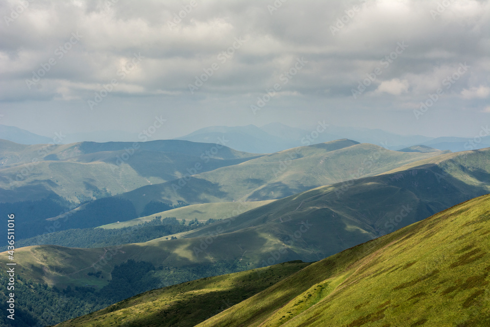 Fototapeta premium green mountain hills and clouds
