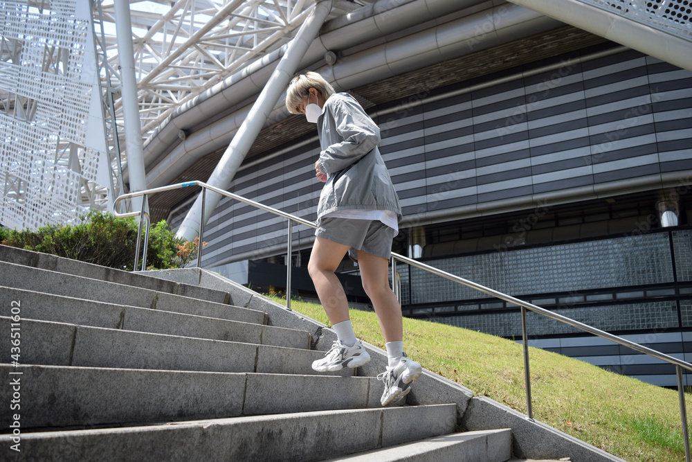 a person who runs up the stairs a person who runs up the stairs