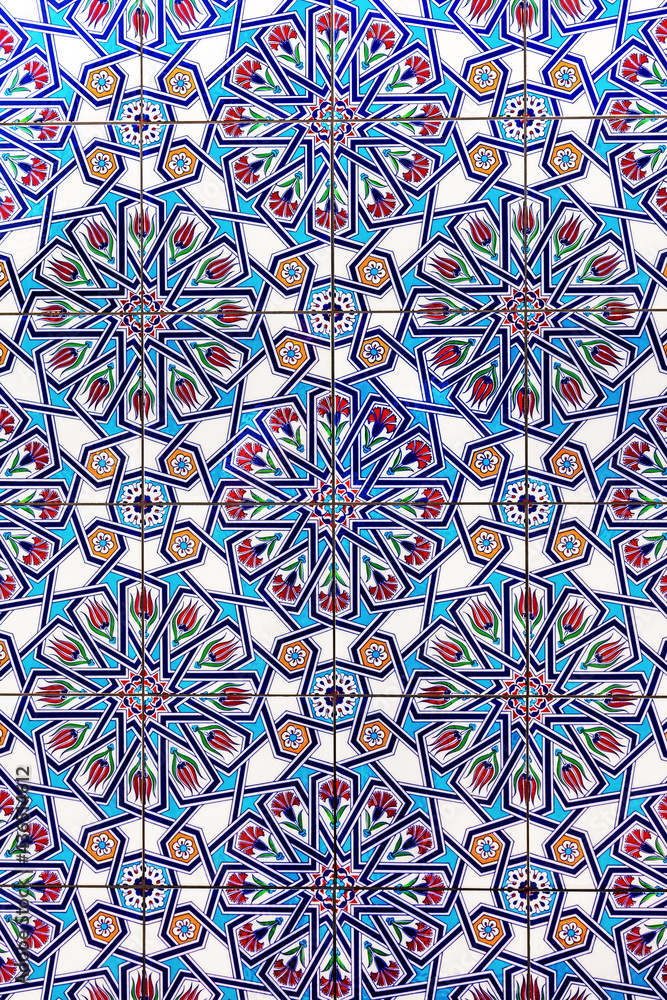 Decorative ceramic colored tiles with a pattern. Colorful multicolored ornament. Unique color design.
