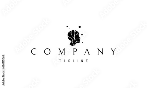 Vector logo on which an abstract image of a human head with a silhouette of a tree inside.