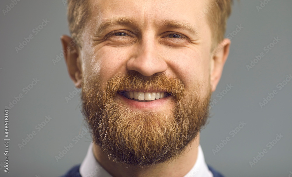 © Studio Romantic - Closeup portrait of happy handsome middle-aged man with thick ginger beard smiling at camera. Studio close up of cheerful bearded guy with friendly open face. Headshot of satisfied barber shop client © Studio Romantic - Closeup portrait of happy handsome middle-aged man with thick ginger beard smiling at camera. Studio close up of cheerful bearded guy with friendly open face. Headshot of satisfied barber shop client