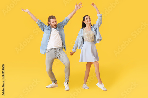 Happy young couple dancing ...