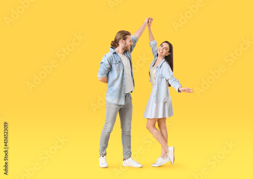 Happy young couple dancing ...