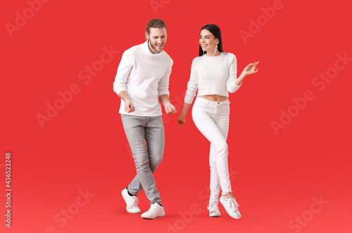 Happy young couple dancing ...