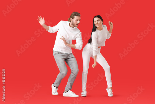 Happy young couple dancing ...